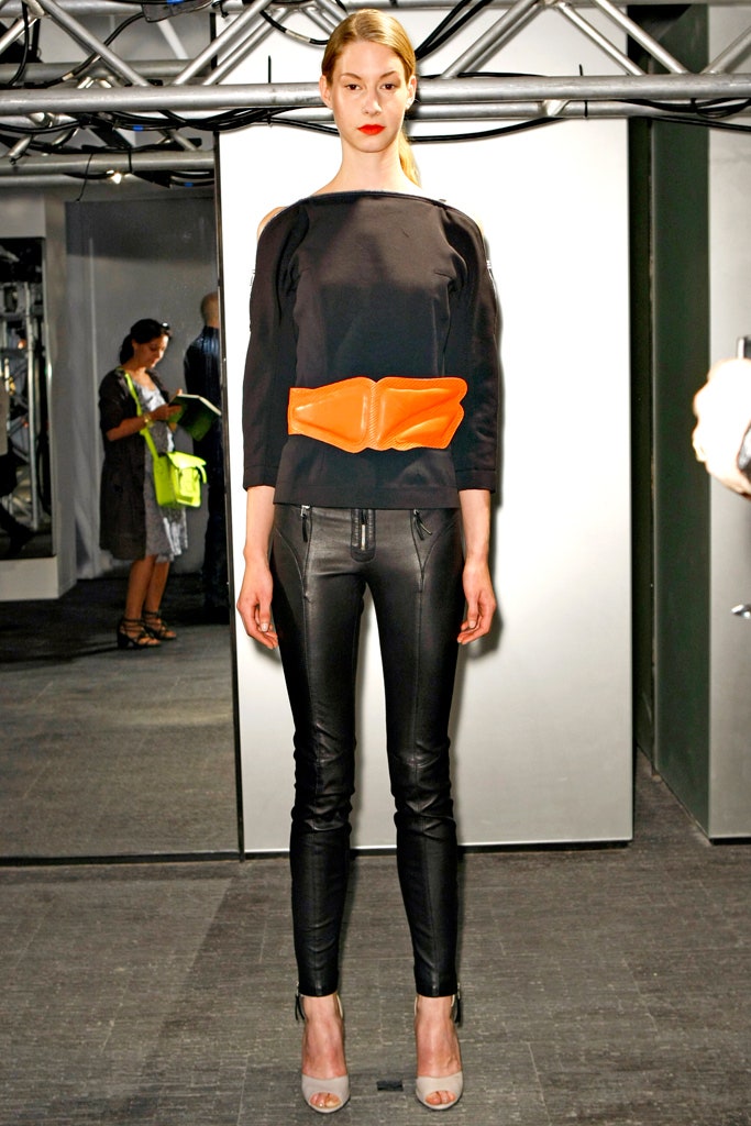 black fitted top with leather pants