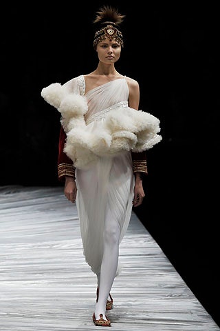 white silk asymmetric dress with red cape