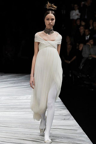 white off-shoulder draped dress