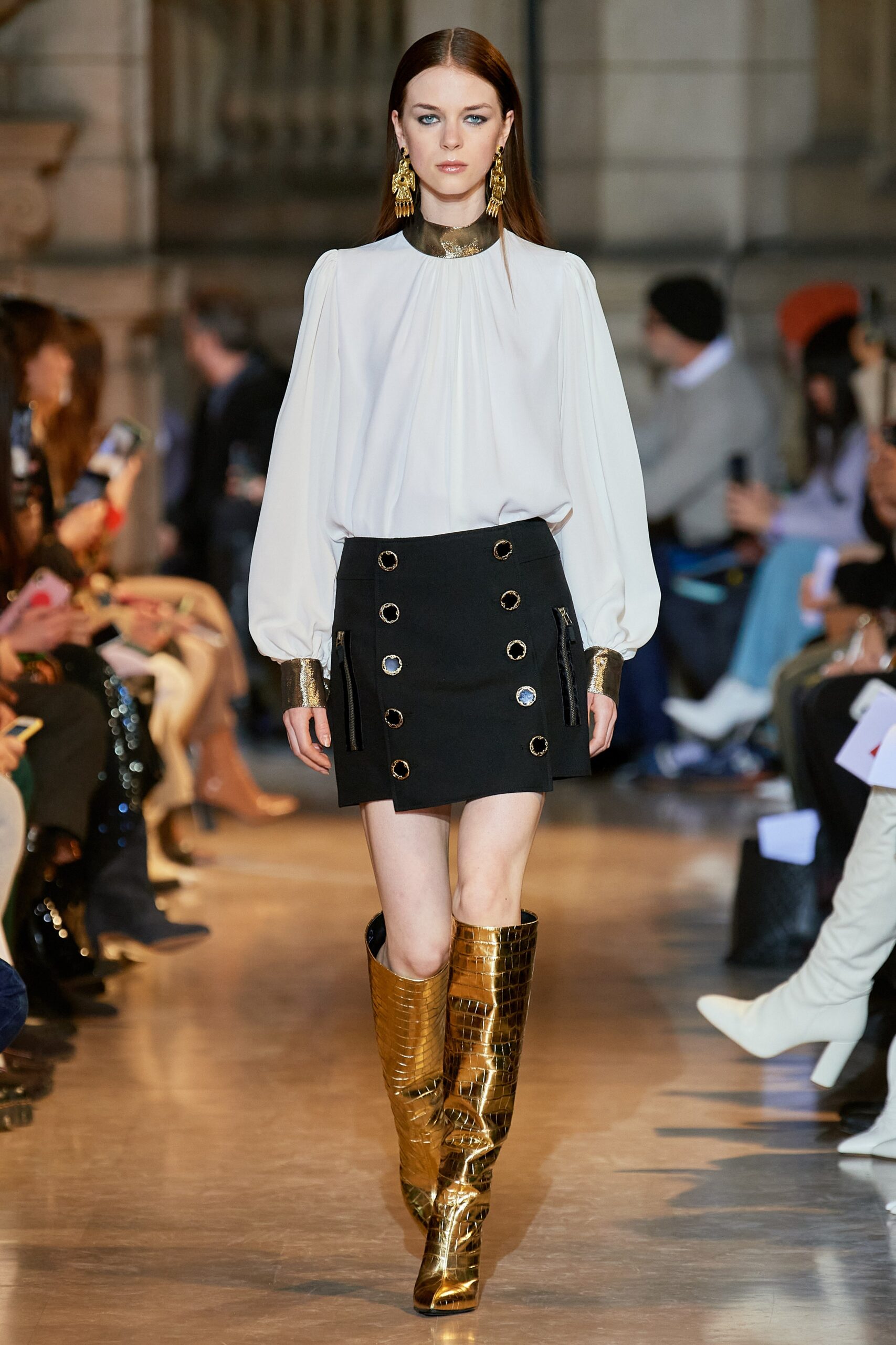 white silk blouse black skirt gold boots