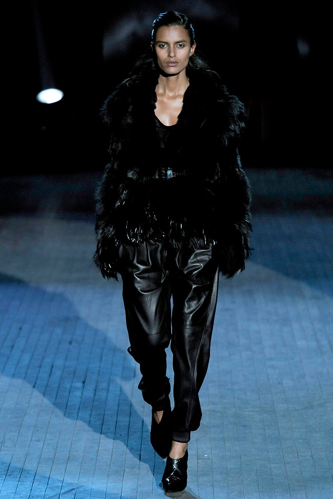 black fur coat and leather pants