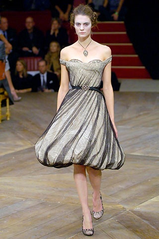 black and gold pleated off-shoulder dress