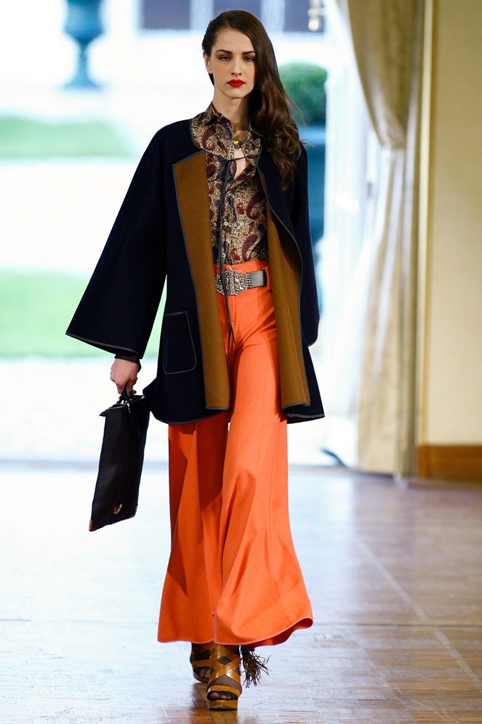black coat with orange pants