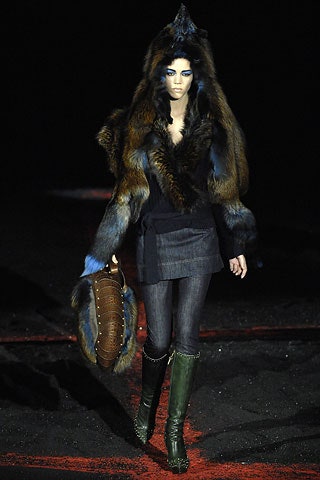 black fitted top with brown fur coat