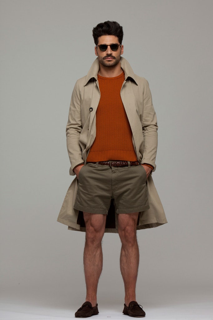 beige trench coat with orange sweater