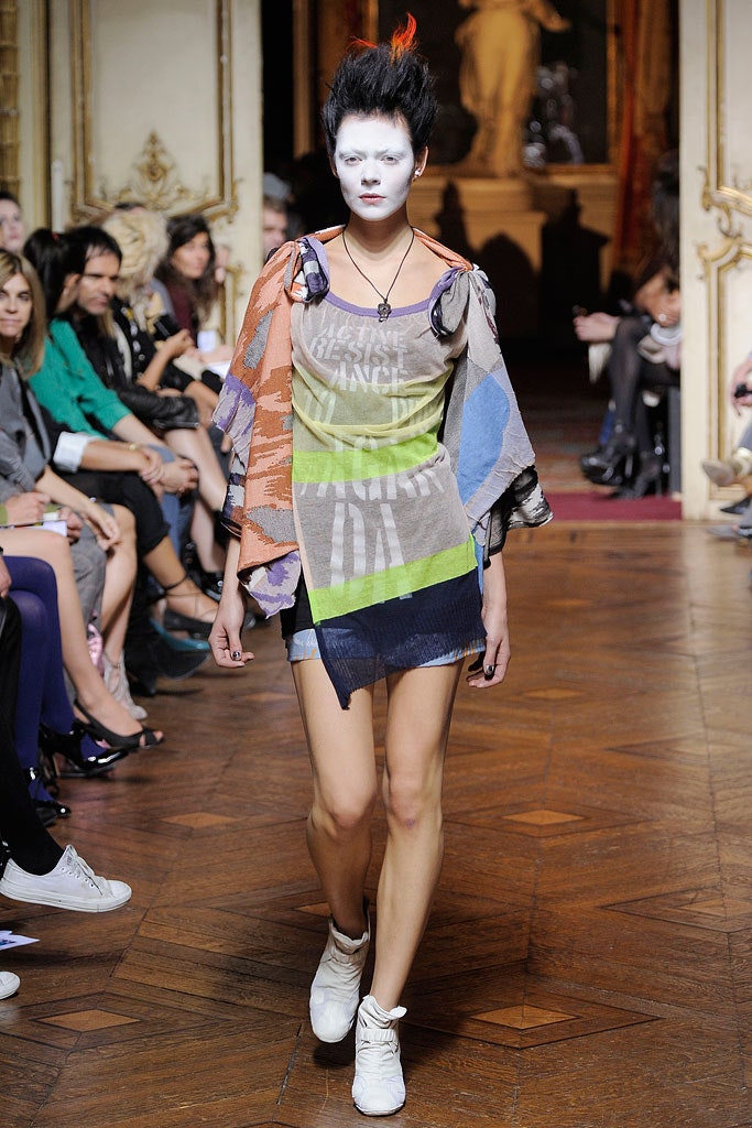 multi-colored relaxed top with denim shorts