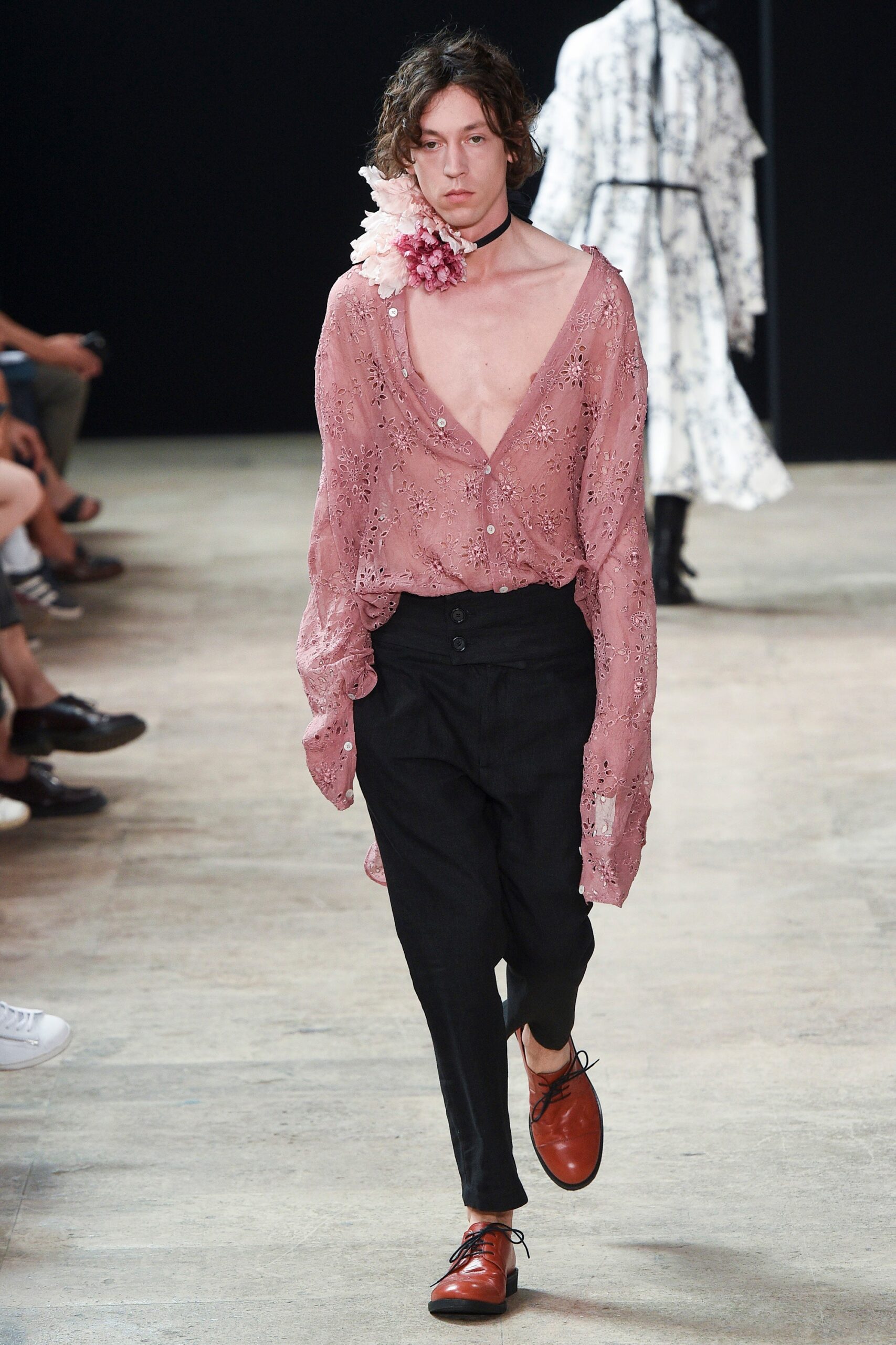 pink lace shirt with black pants