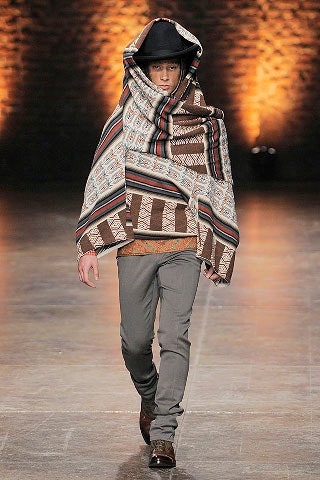 brown wool poncho with gray pants