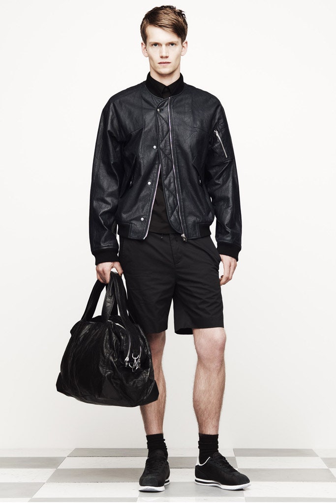 black leather spiked bag