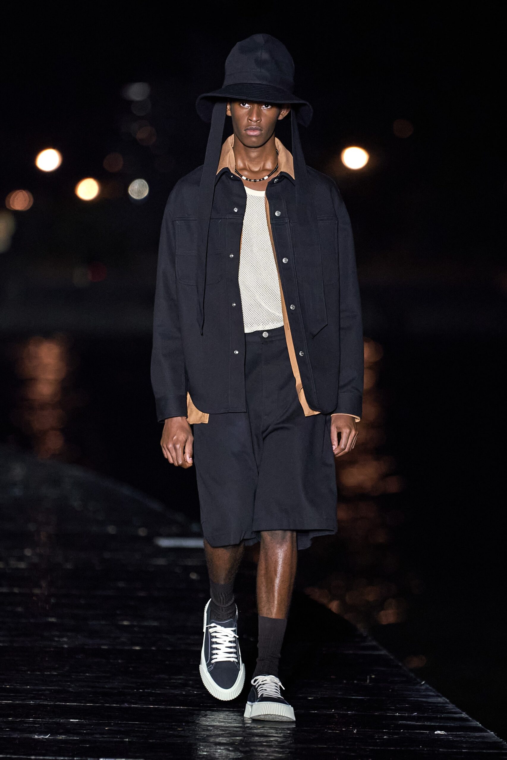 black relaxed jacket with beige shirt