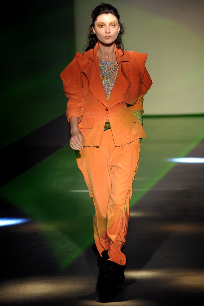 structured orange blazer with tailored pants