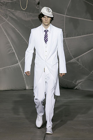 white tailored suit with cap