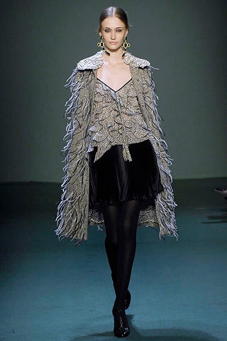 black mini dress with gray cape