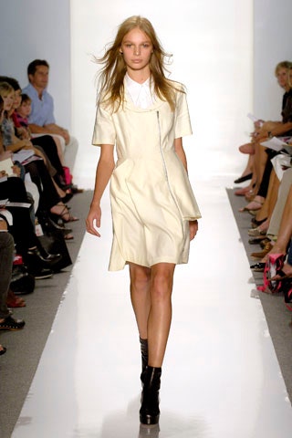 white fitted dress with black boots