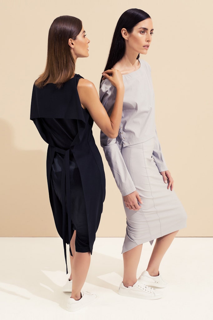 black draped dress and gray top