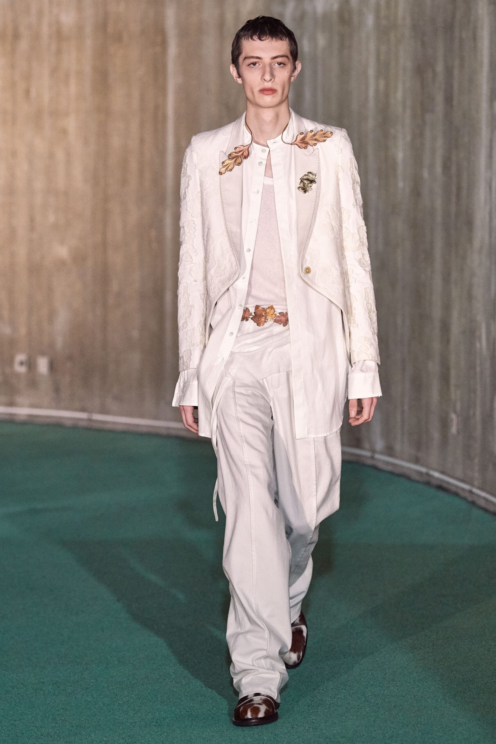 white fitted blazer with embroidered details