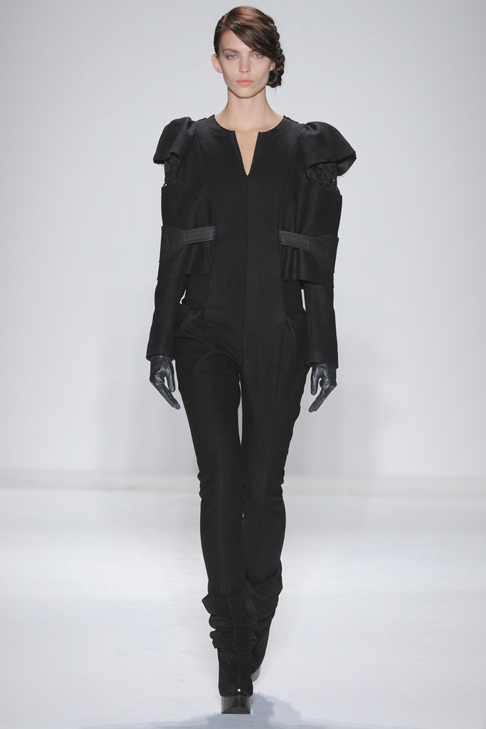 black fitted jumpsuit with gloves