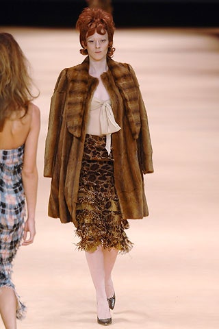 brown fur coat with beige top
