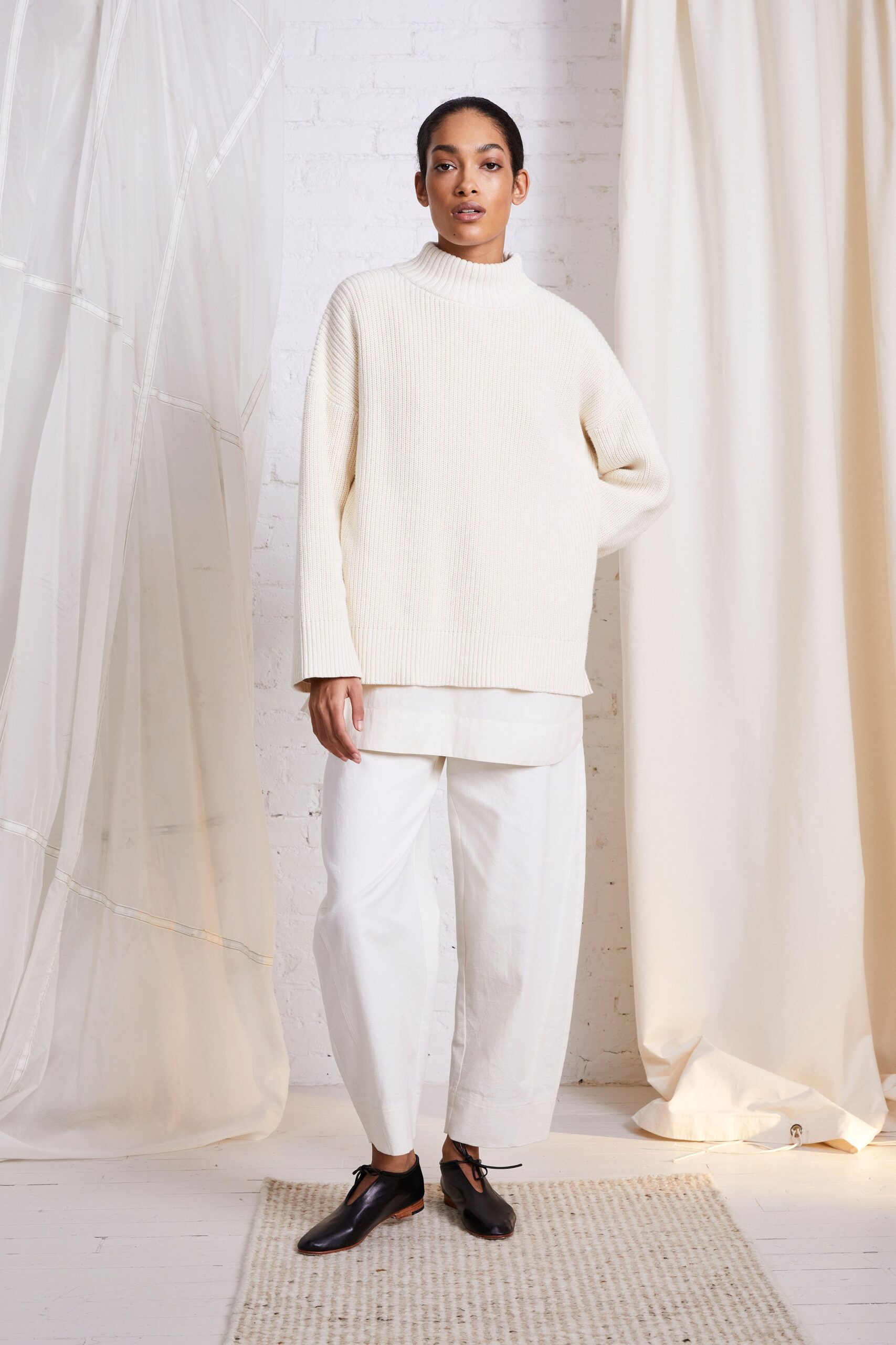 white relaxed sweater and pants