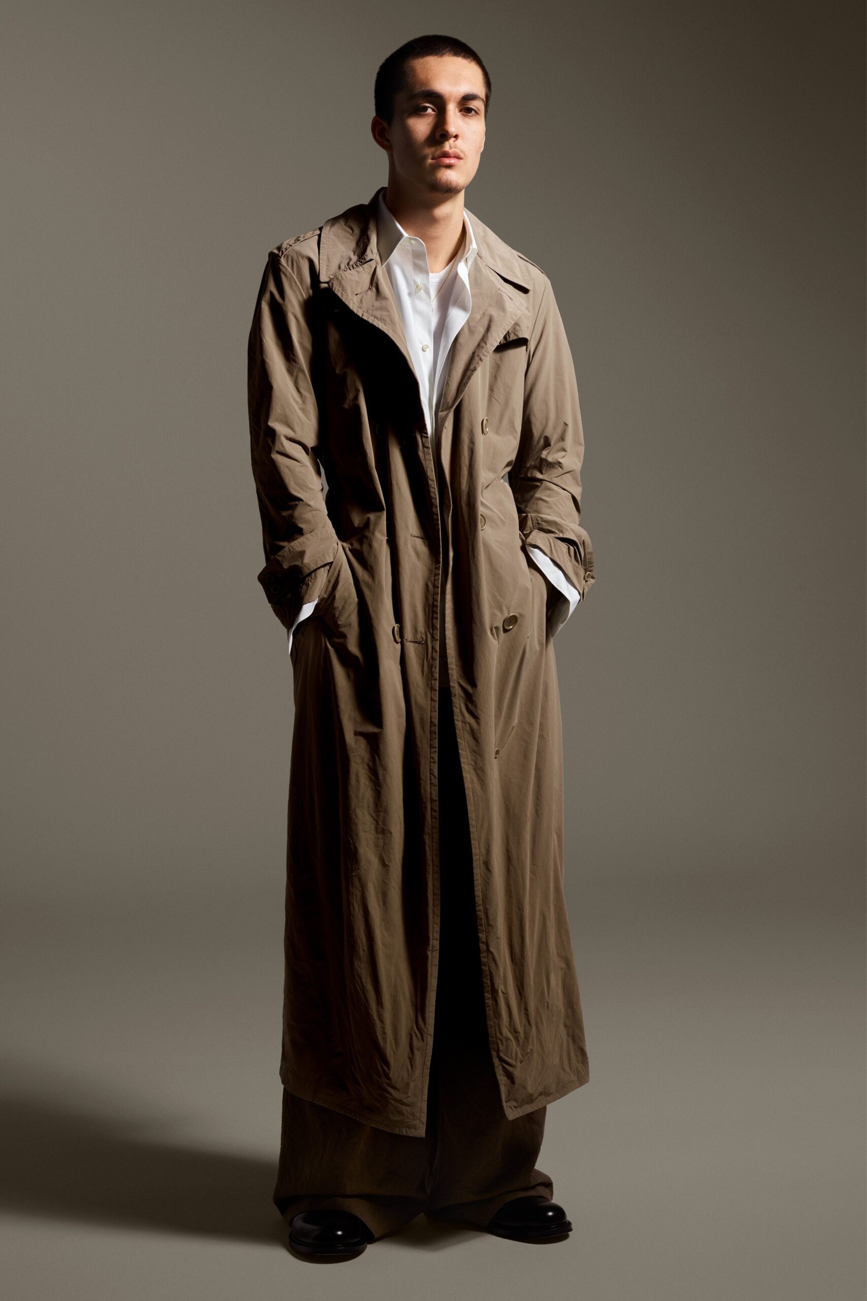 beige trench coat with white shirt