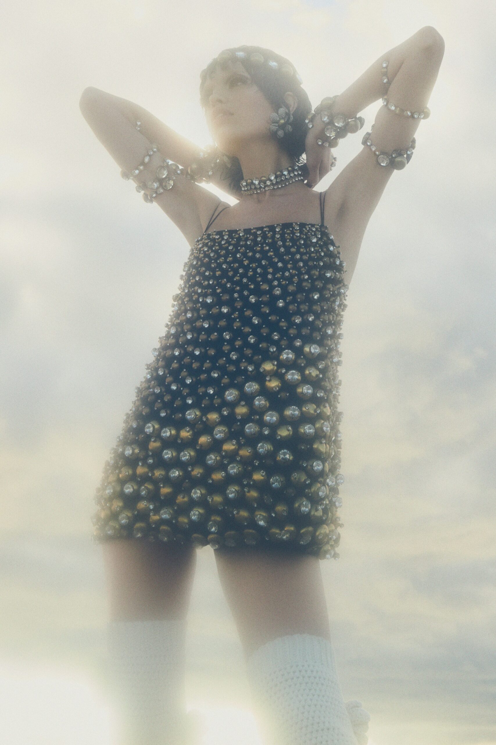 black beaded sleeveless mini dress