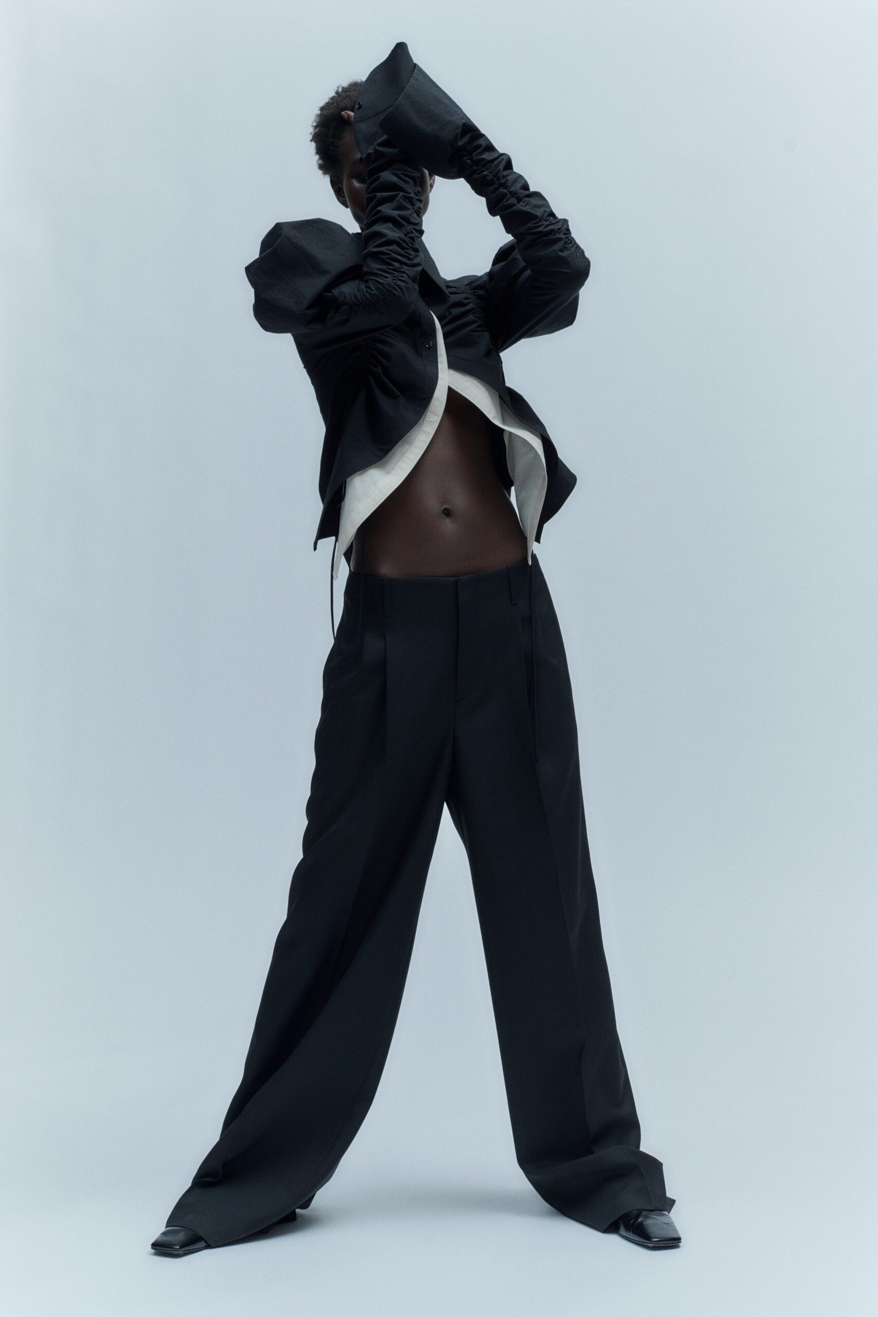 black cotton long-sleeve collared fitted ruffled jacket