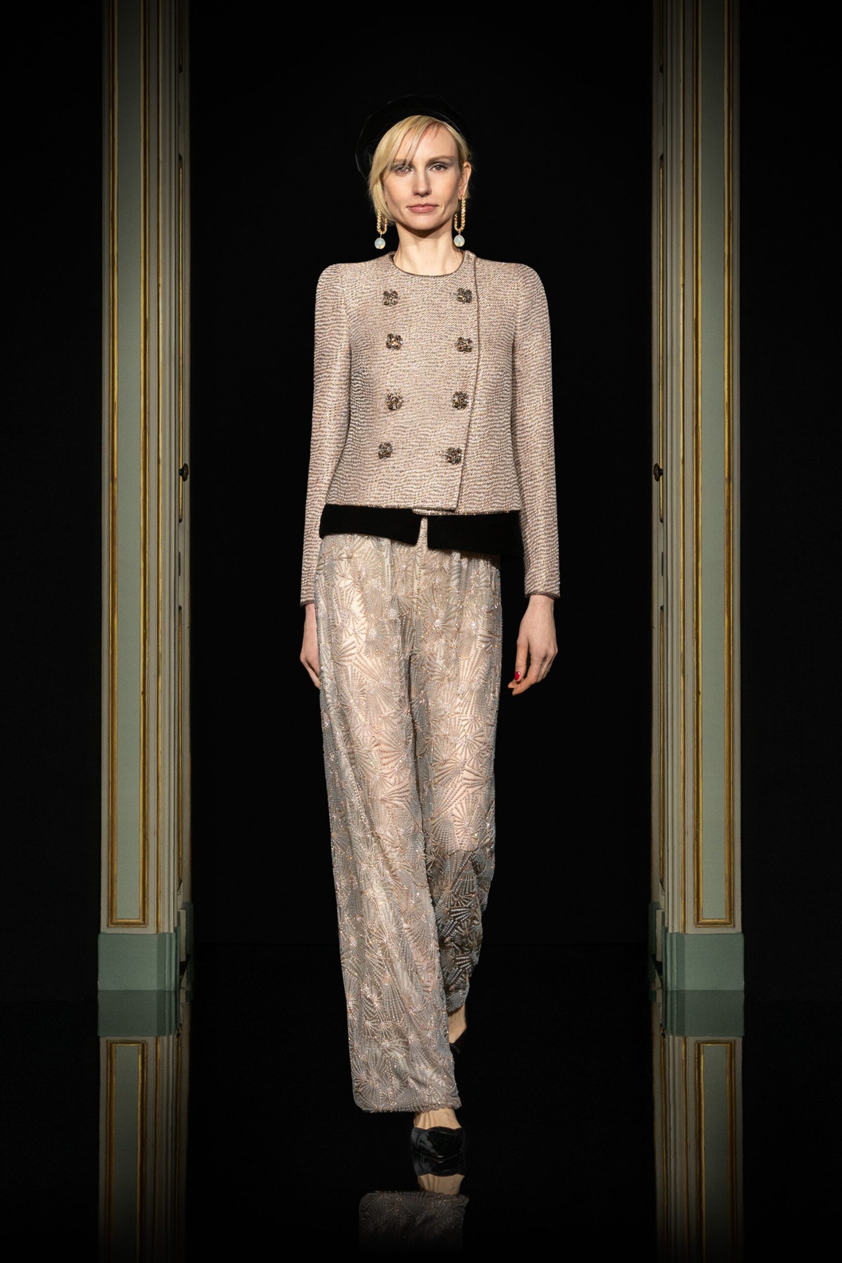 beige tailored jacket and gray wide-leg pants