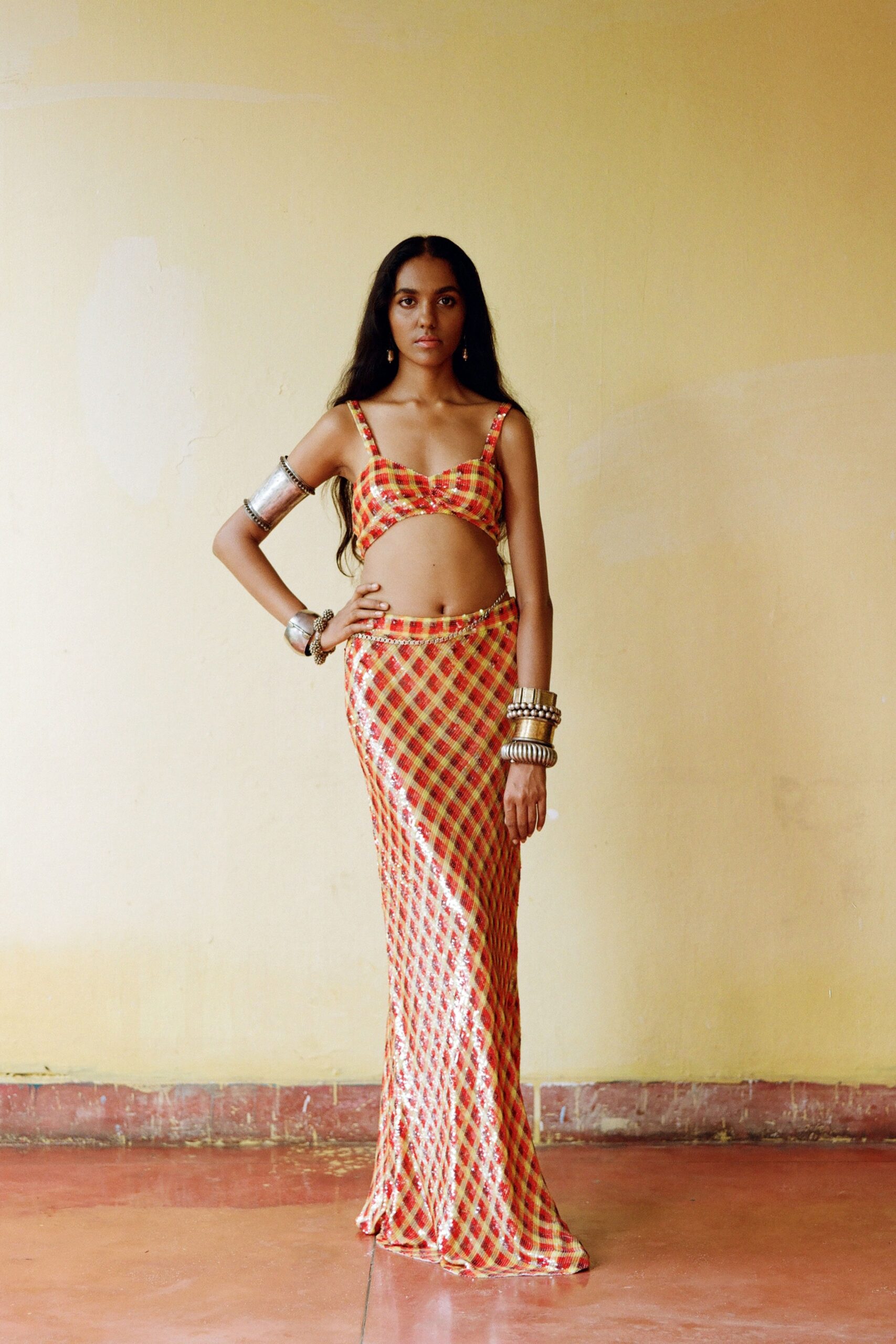 red and yellow checked crop-top and maxi skirt