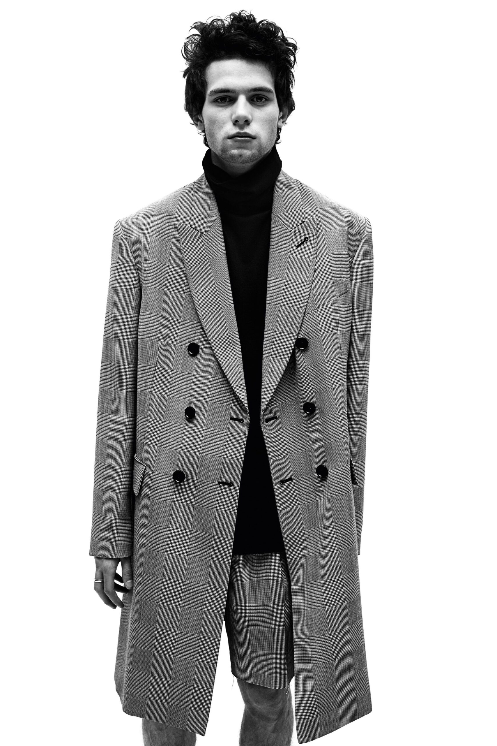 gray wool coat with black turtleneck