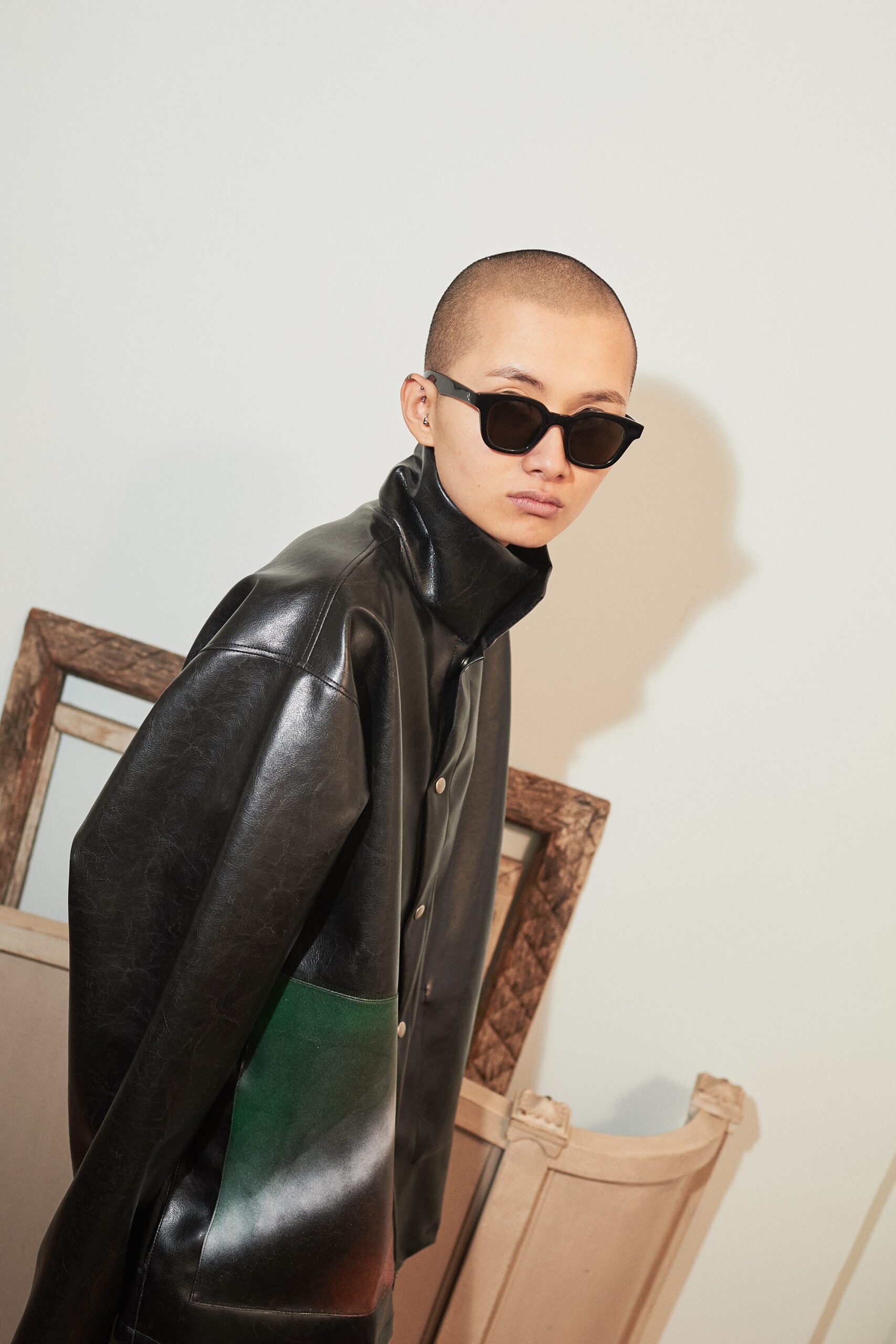 black leather relaxed jacket with sunglasses