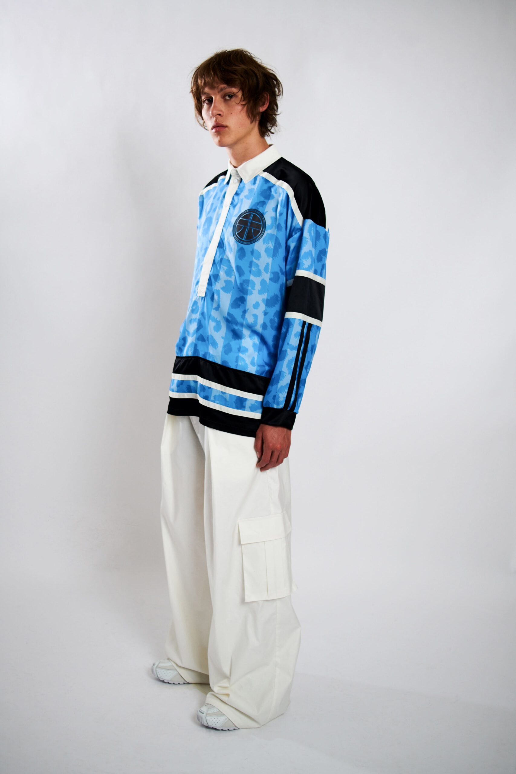 blue printed shirt and white cargo pants