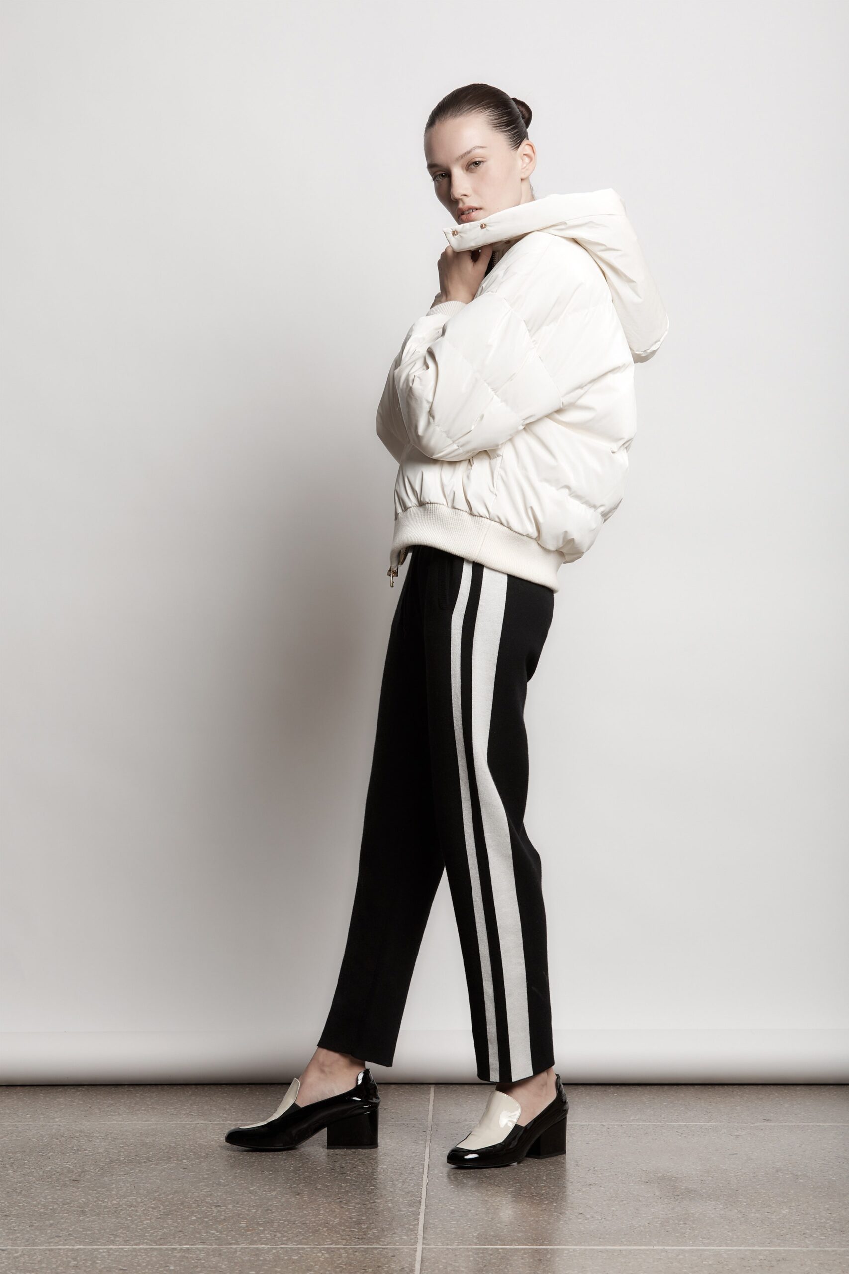 white relaxed hoodie and black pants