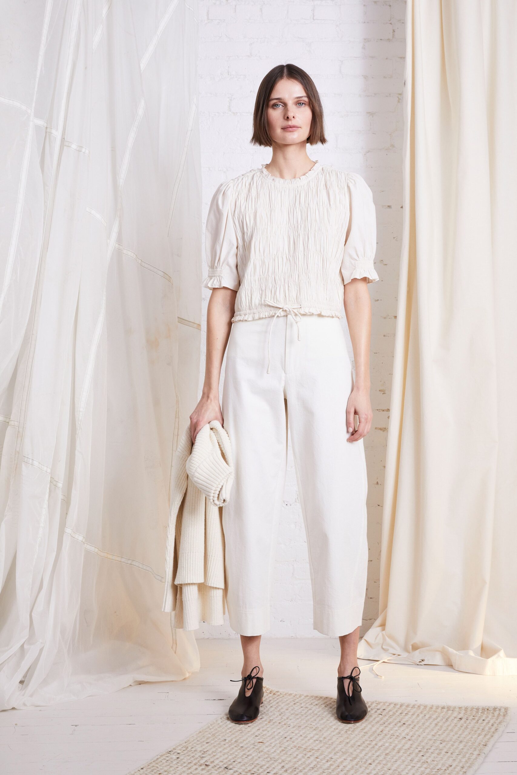 white fitted top and relaxed pants