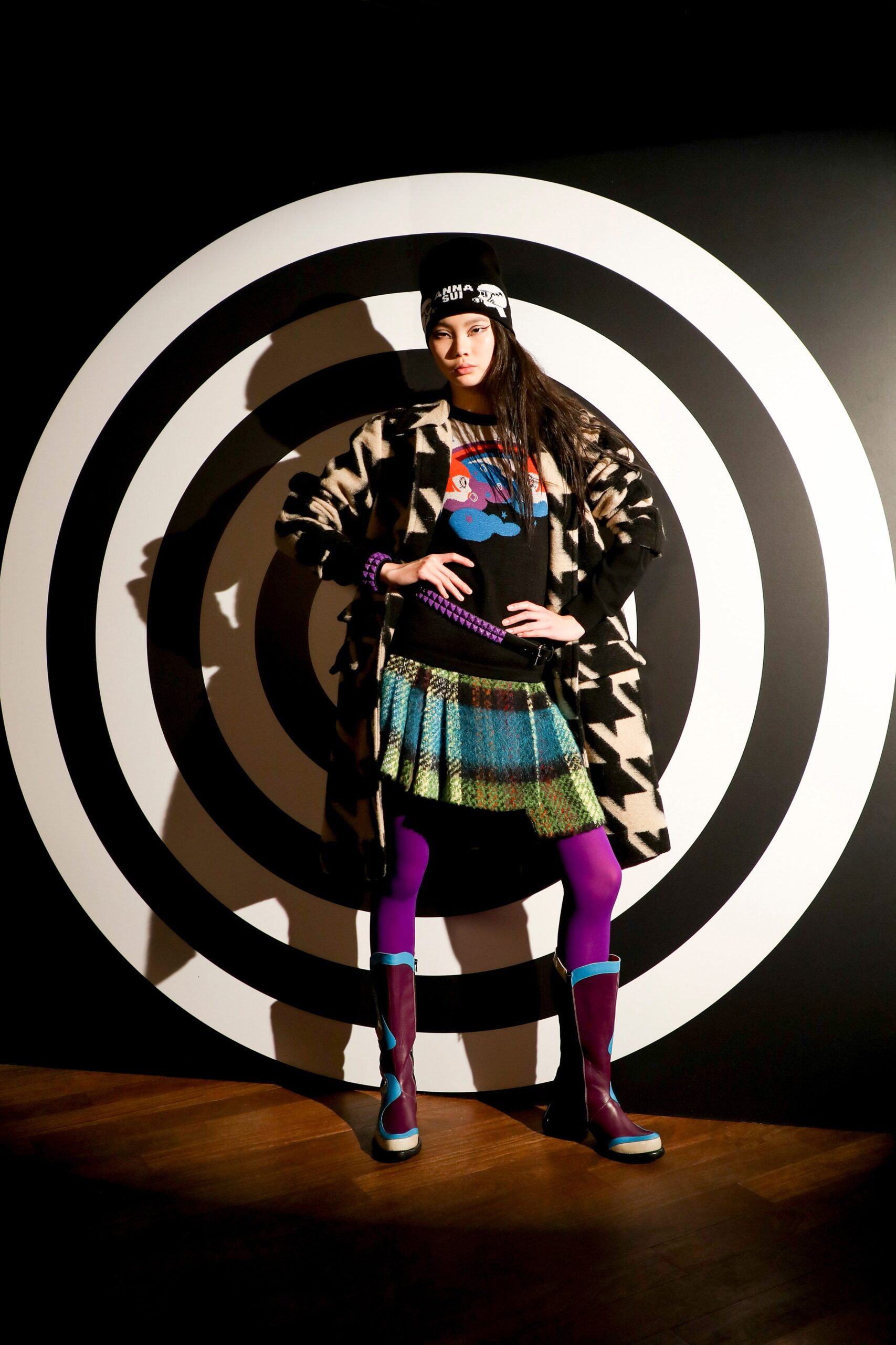 black and white printed coat with colorful skirt