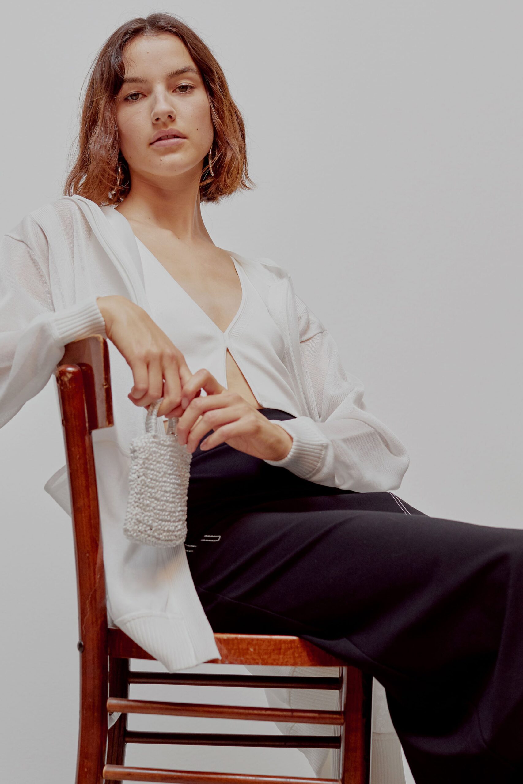 white fitted top and black pencil skirt