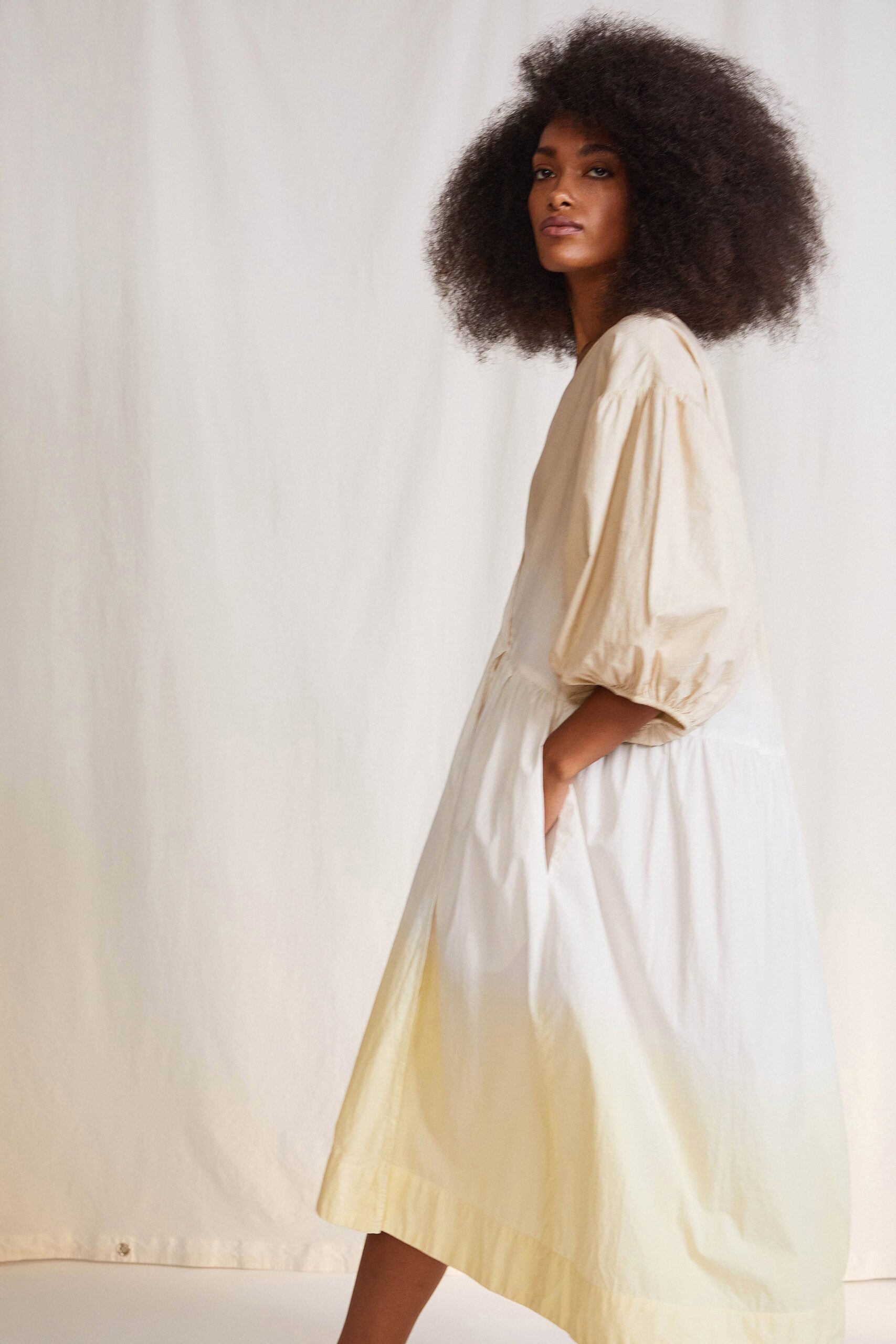 beige and white tiered midi dress