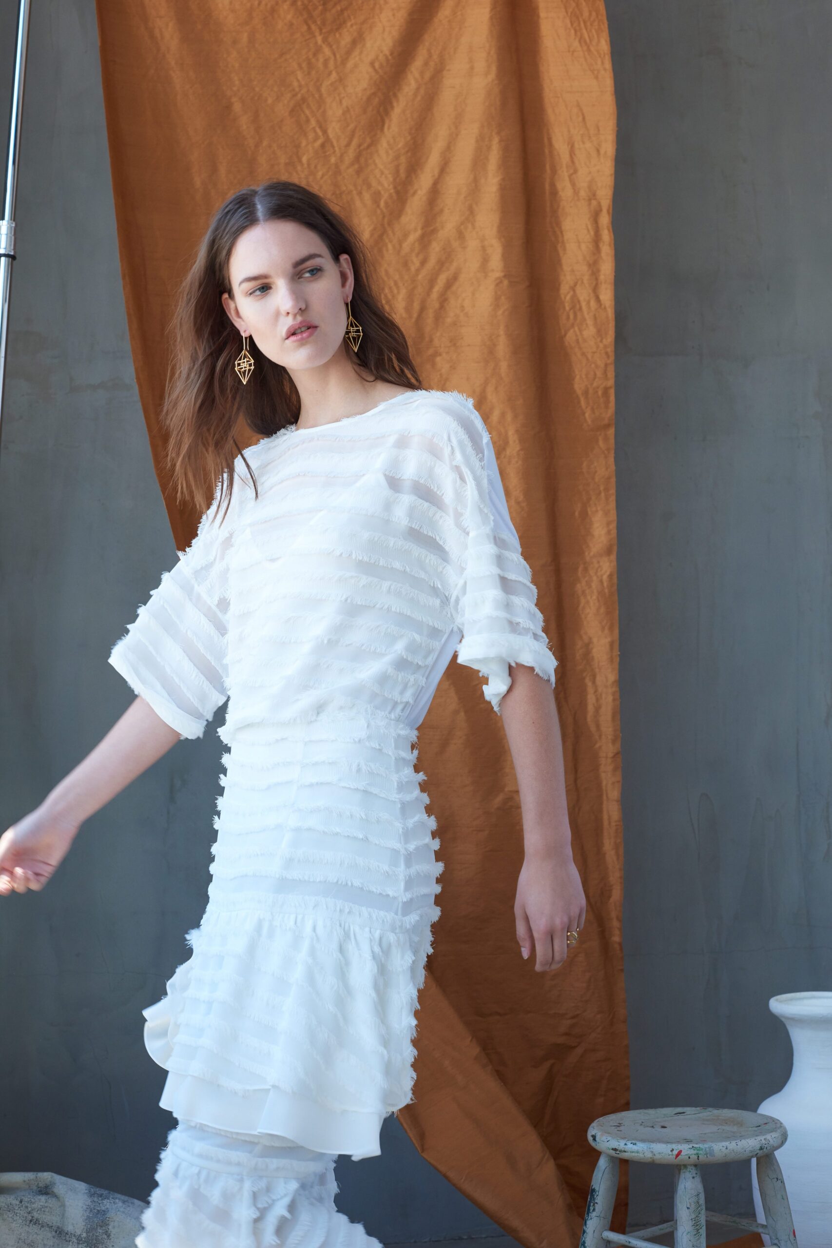 white ruffled midi dress