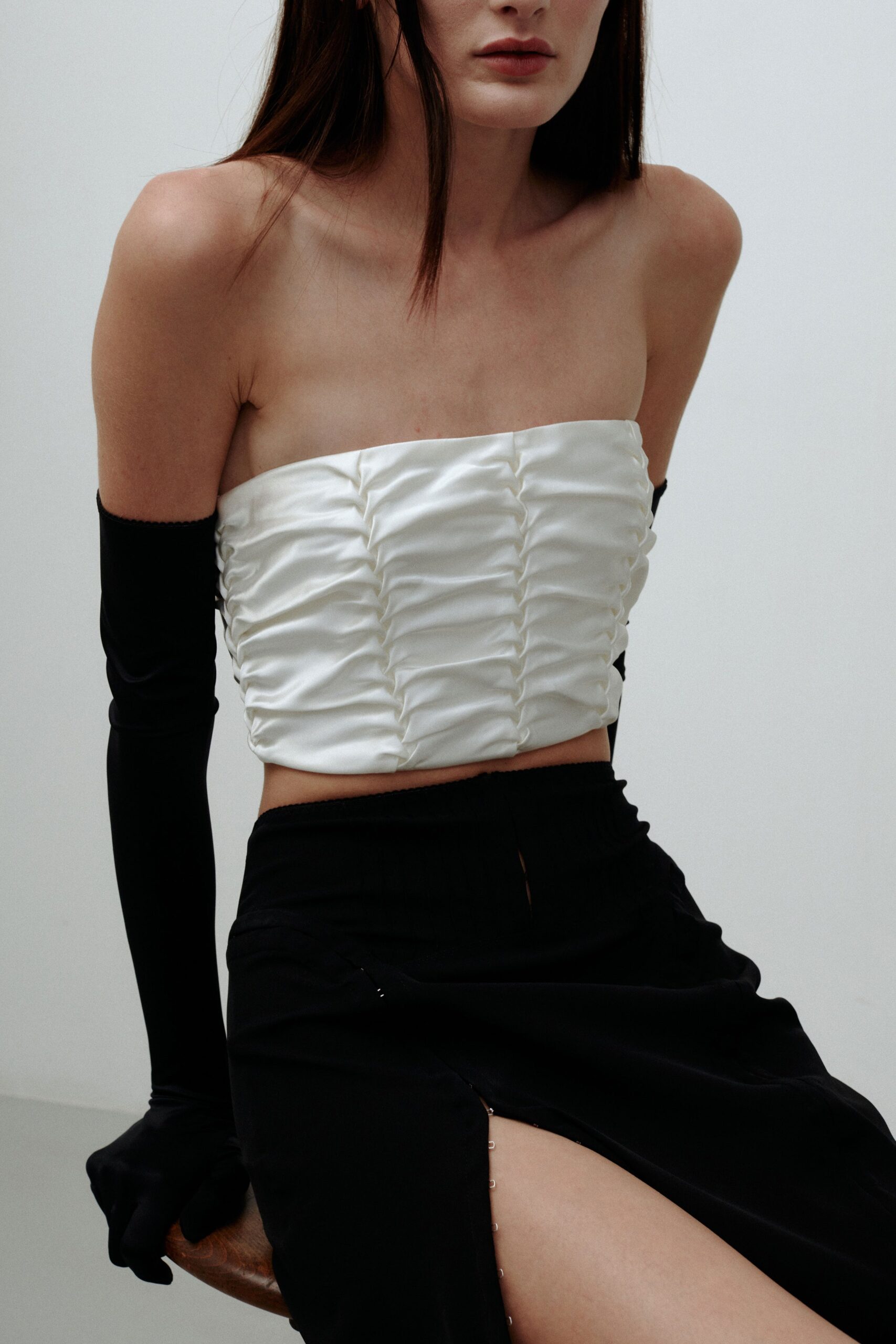 white silk sleeveless strapless fitted ruched cropped top