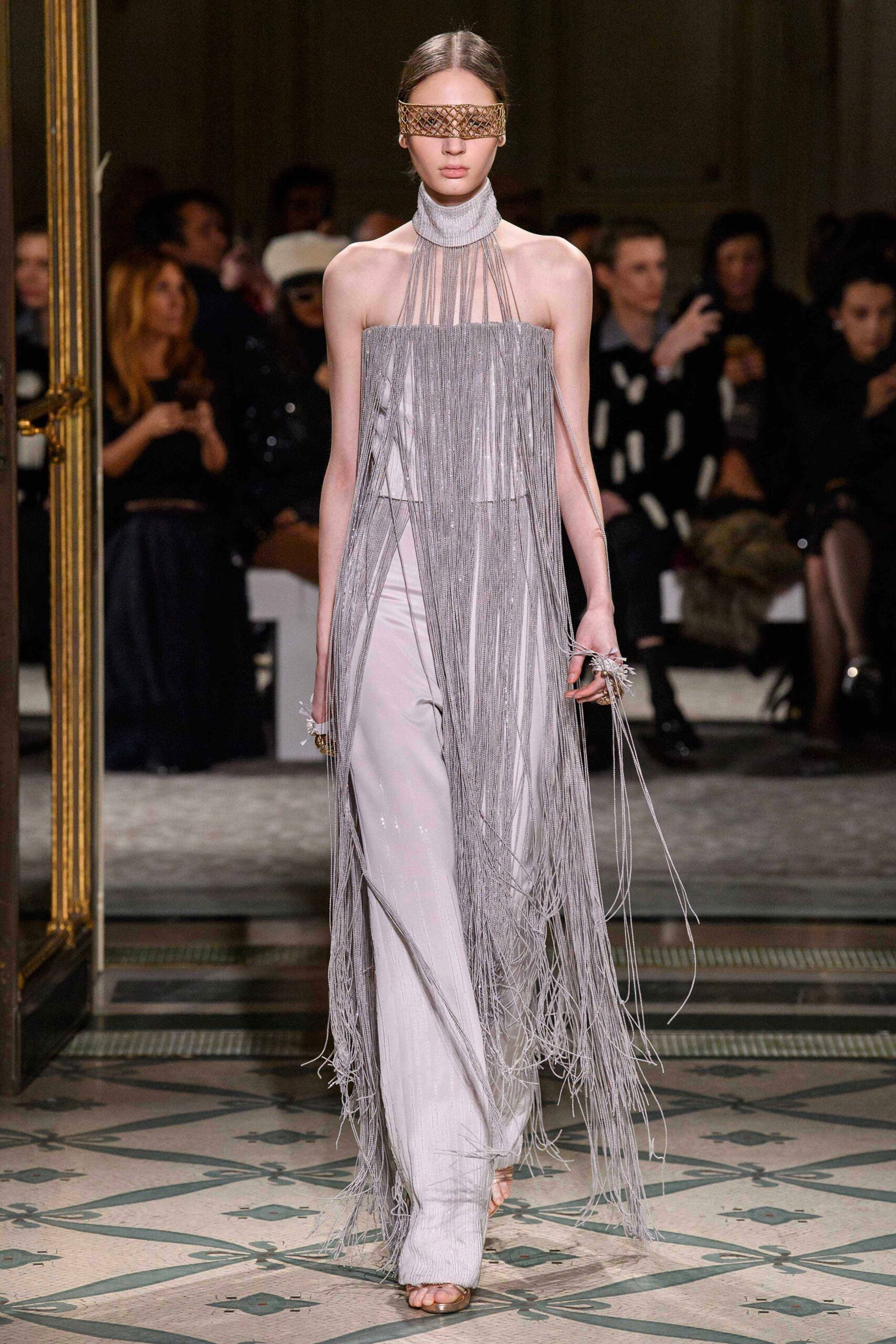 gray silk sleeveless high-neck fitted fringed flowing dress