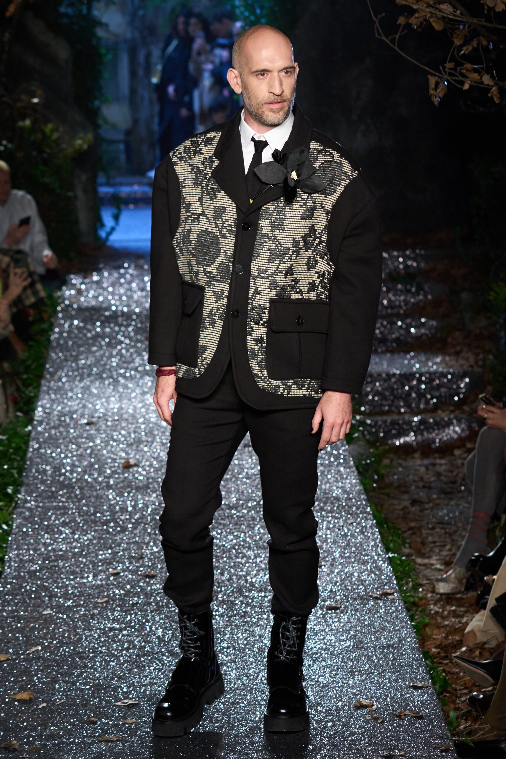 black and white printed jacket with fitted pants