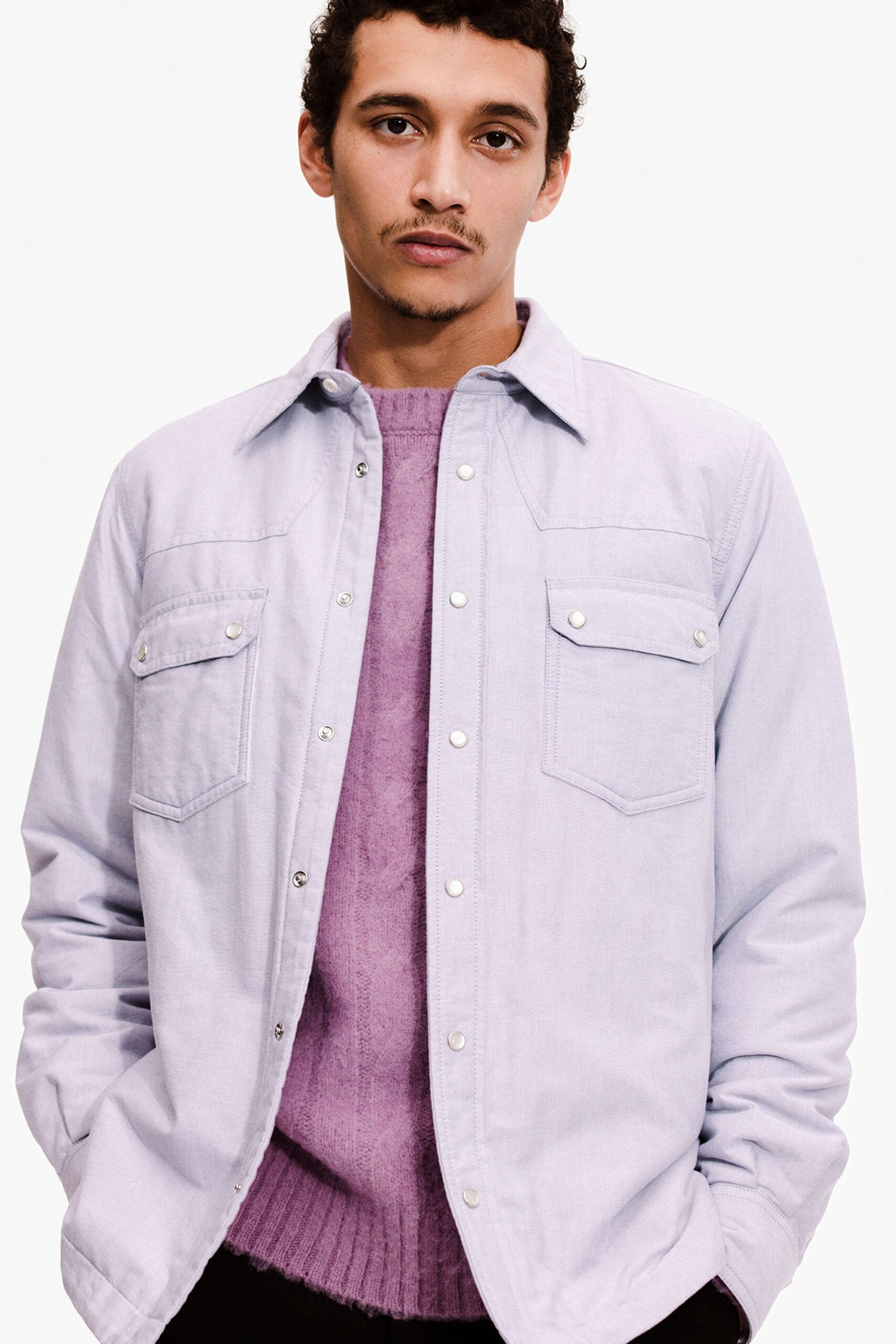 light purple shirt with purple sweater