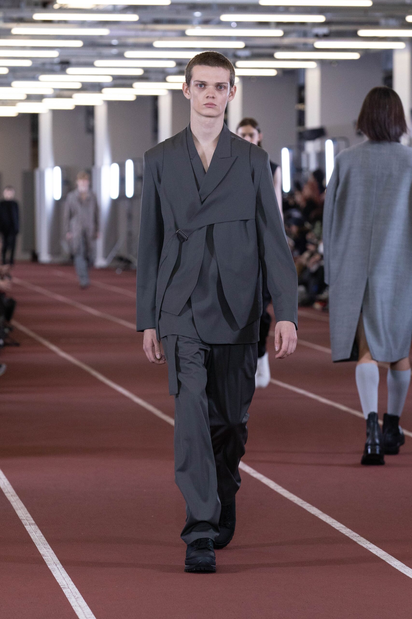 gray tailored suit with straight-leg pants