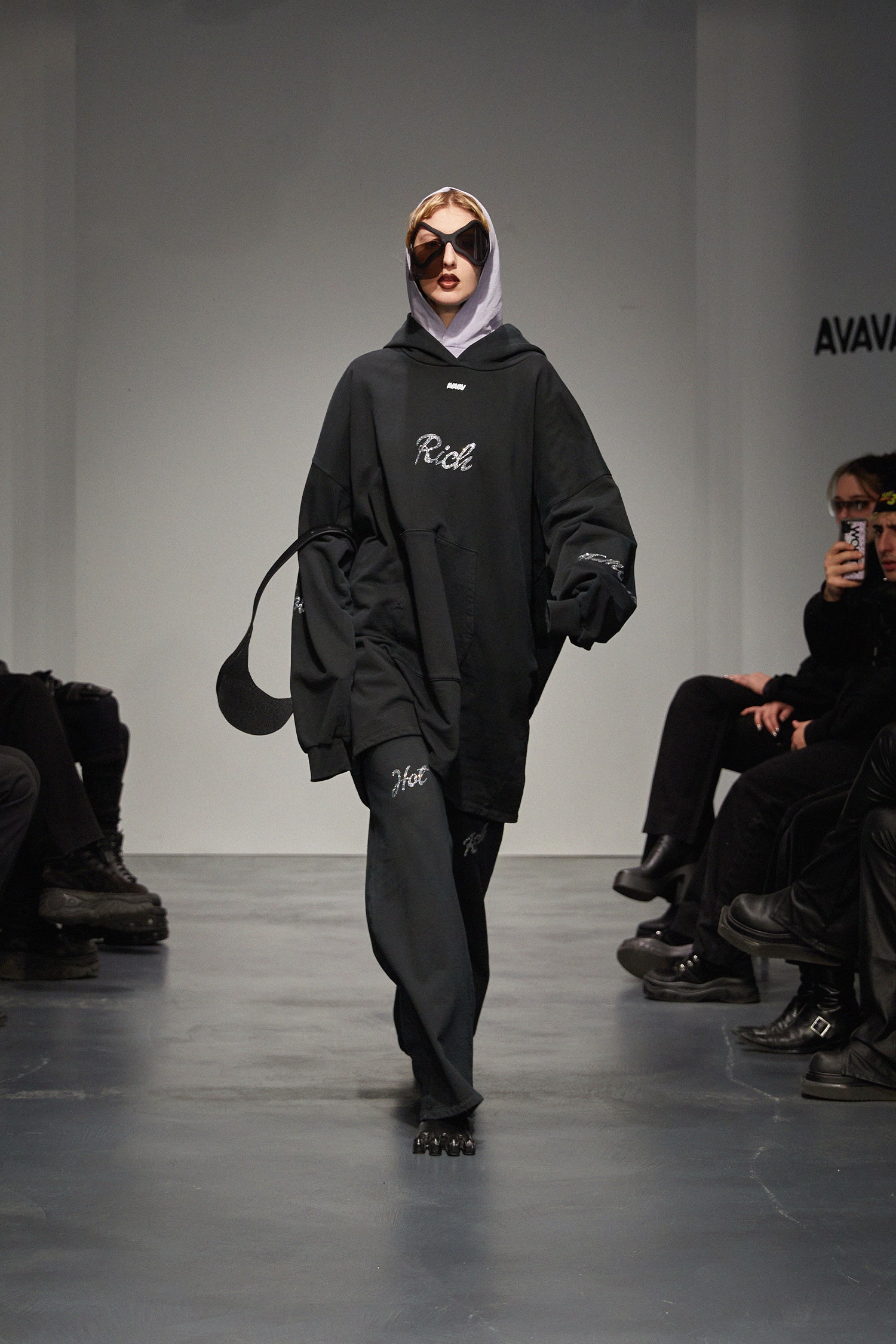 black oversized hoodie and relaxed pants