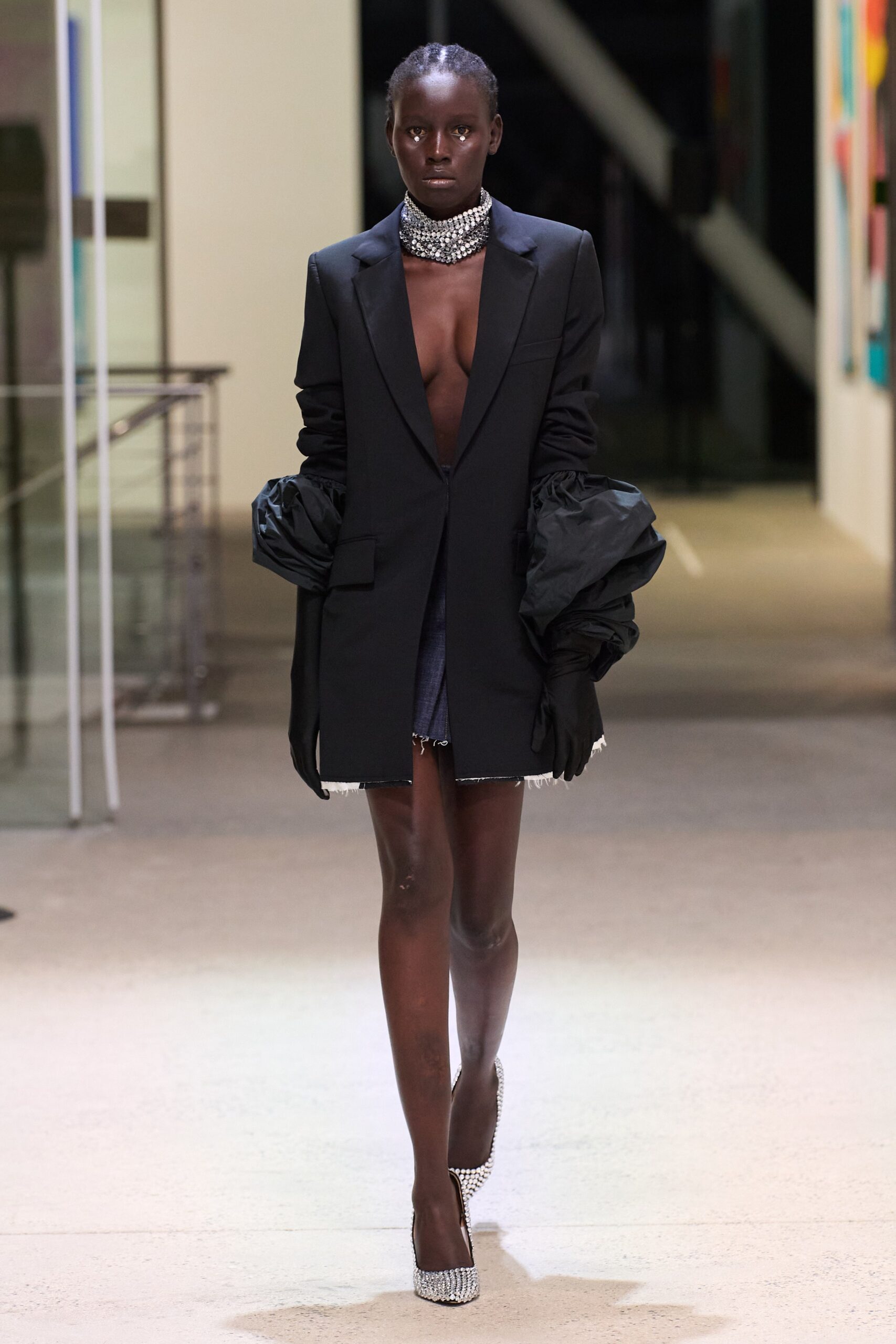 black tailored blazer with denim skirt
