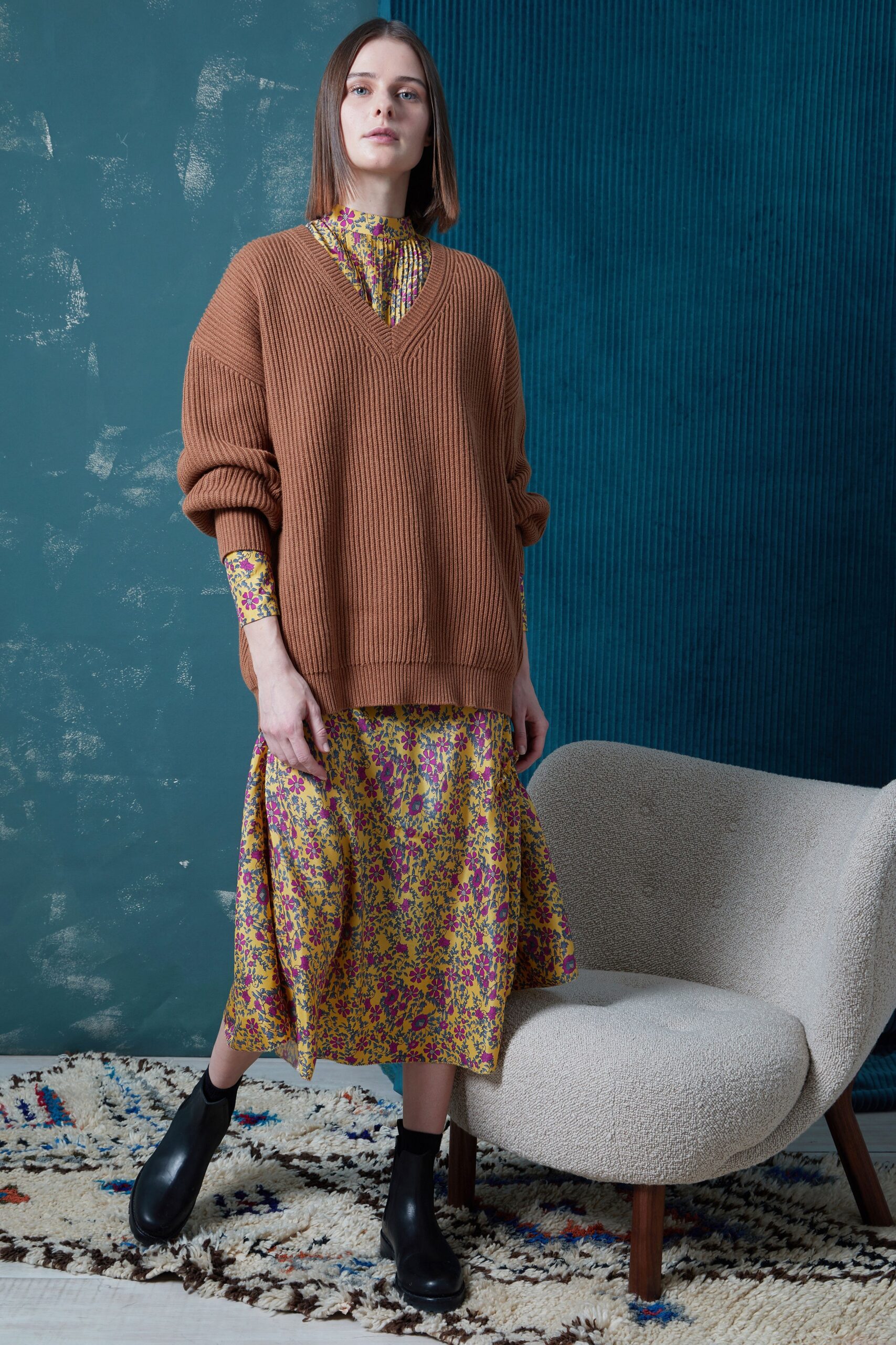 brown oversized sweater with floral dress