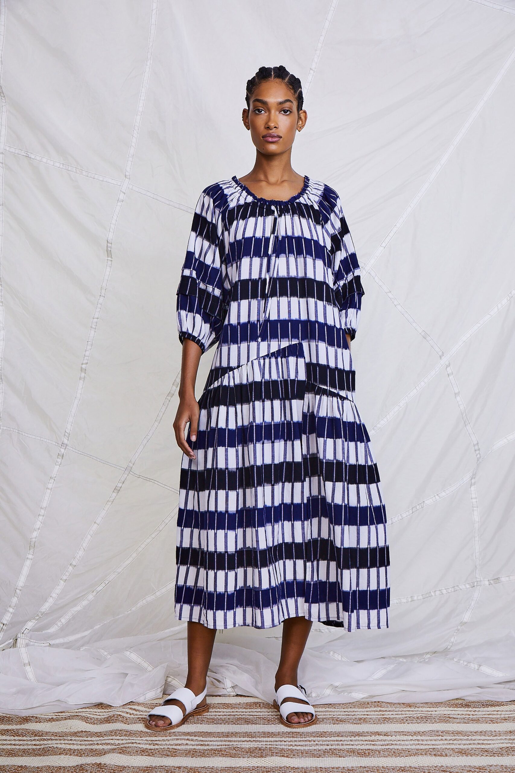 blue and white pleated midi dress