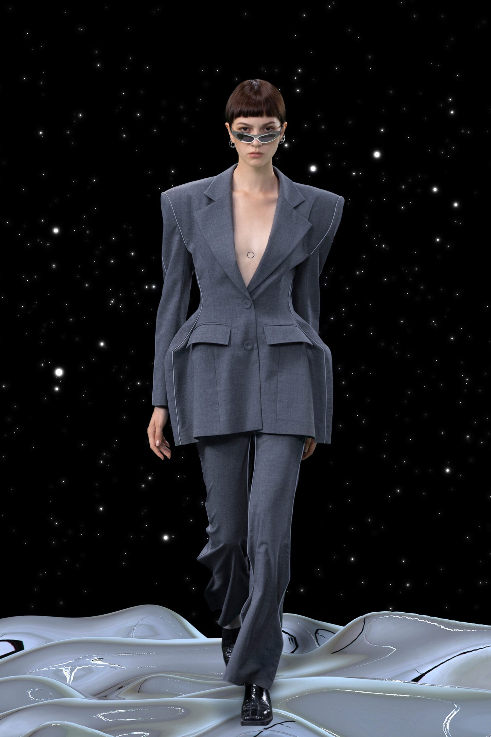 gray tailored suit with sunglasses