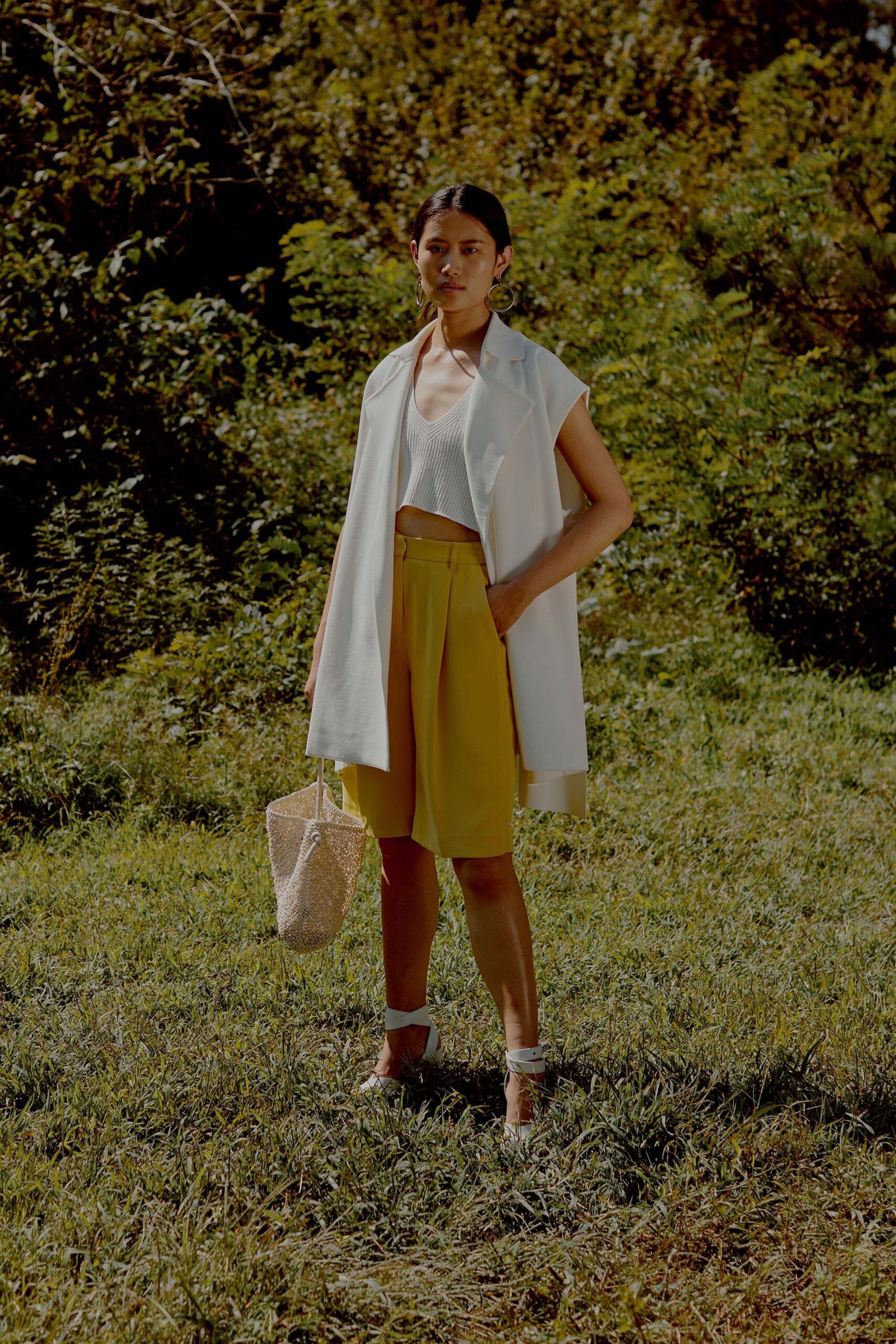 white top yellow shorts oversized coat