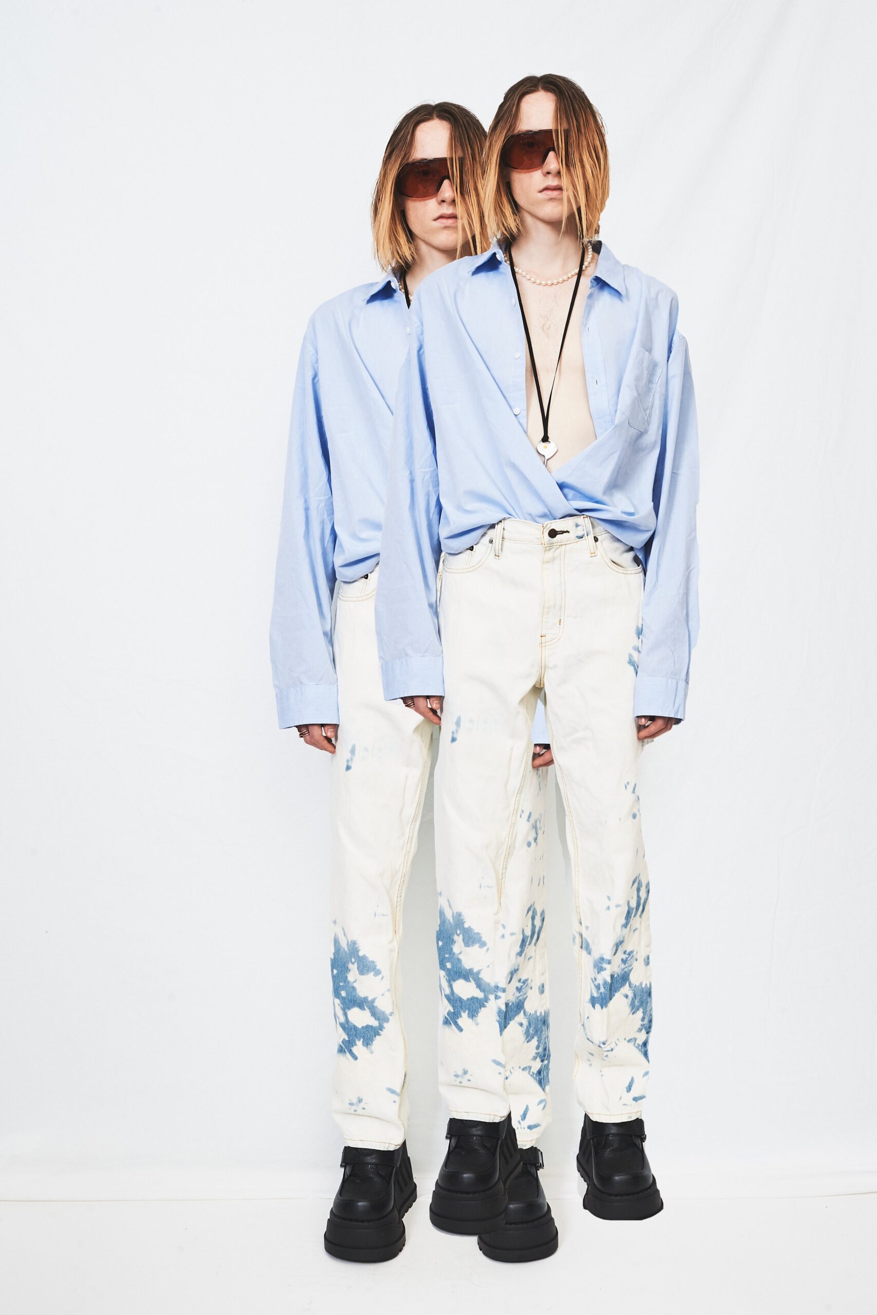 blue relaxed shirt with distressed pants