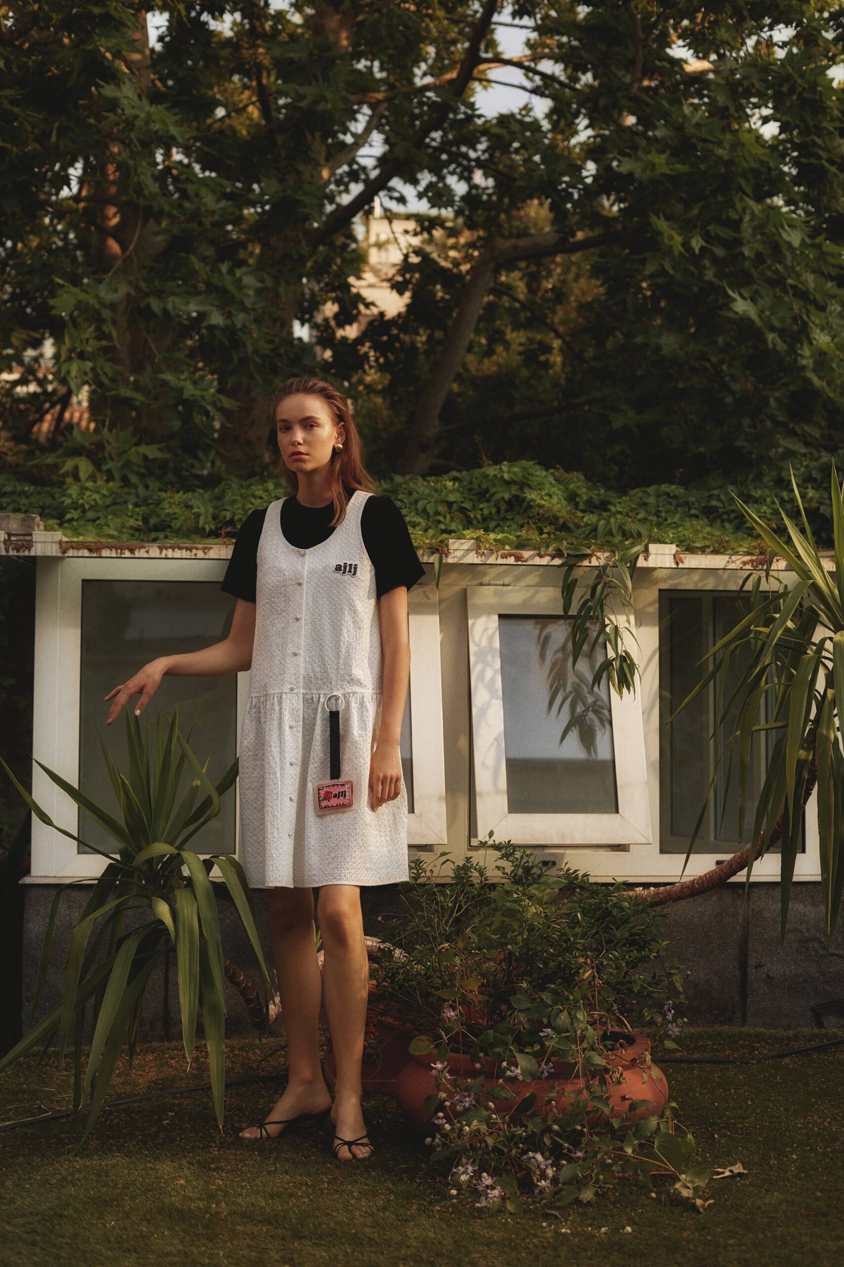 white mini dress with black top